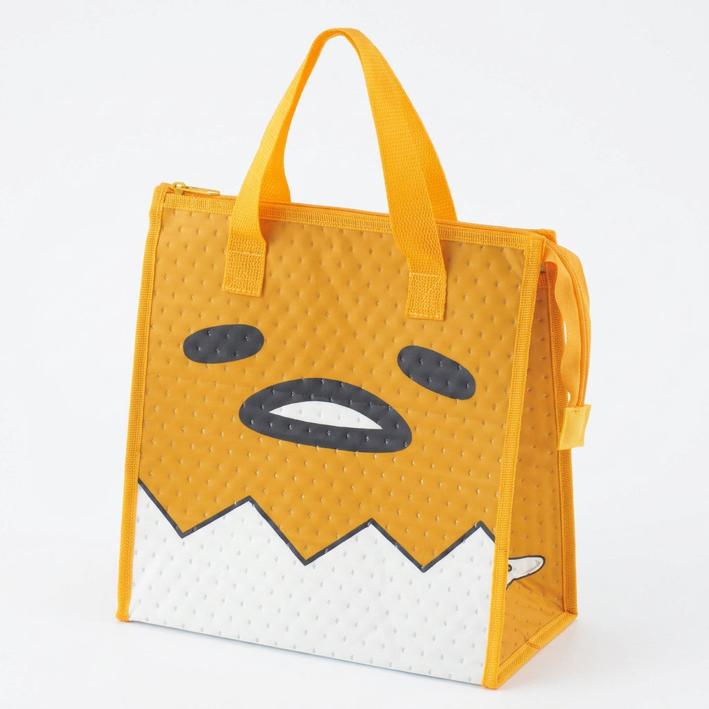Gudetama Face insulated lunch bag in yellow with large face design and white eggshell base