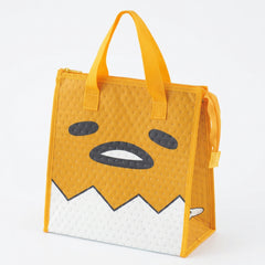 Gudetama Face insulated lunch bag in yellow with large face design and white eggshell base