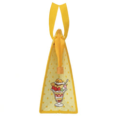 Side view of the Gudetama lunch bag showing the zipper and dessert artwork