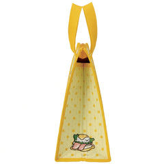 Side of the yellow Gudetama lunch bag with sandwich artwork and gusseted base